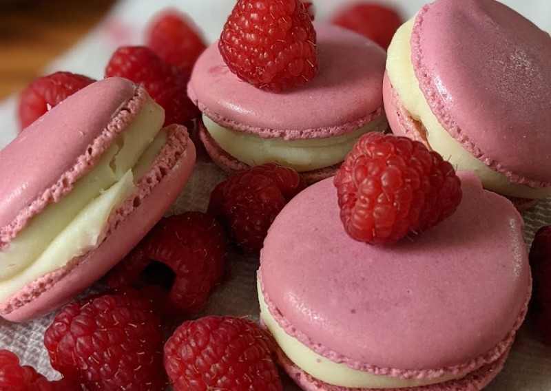 Raspberries and raspberry white chocolate filled macarons